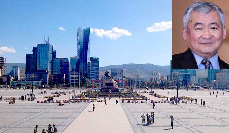 Photo: Dr Jargalsaikhan Enkhsaikhan (Credit: Global Peace Foundation) against the backdrop of Chinggis Khaan (Sükhbaatar) Square in Ulaanbaatar, the capital and largest city of Mongolia. Source: Hostelman ID