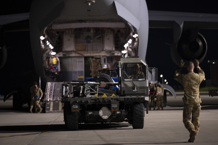 Photo: Airmen load security assistance cargo for Ukraine aboard a C-17 Globemaster III at Travis Air Force Base, Calif., Feb. 14, 2022. Photo By: Air Force Senior Airman Karla Parra
